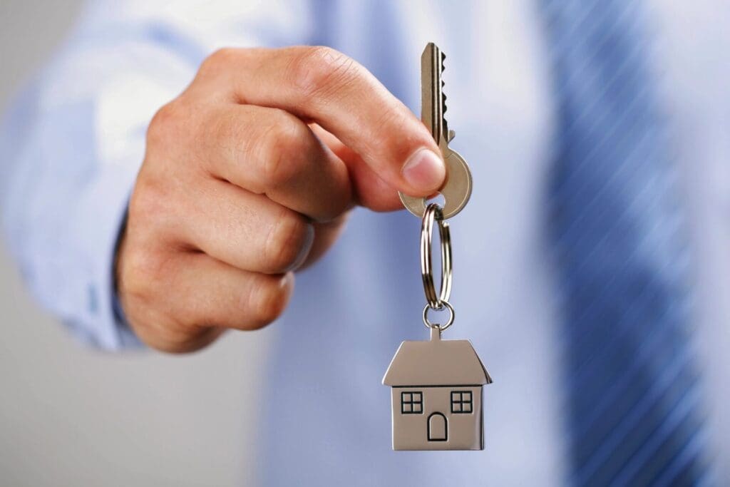A key with a house charm